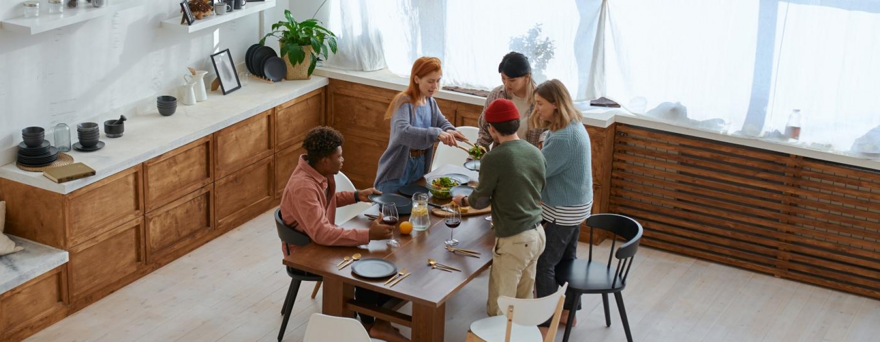 a group of people sitting around a table